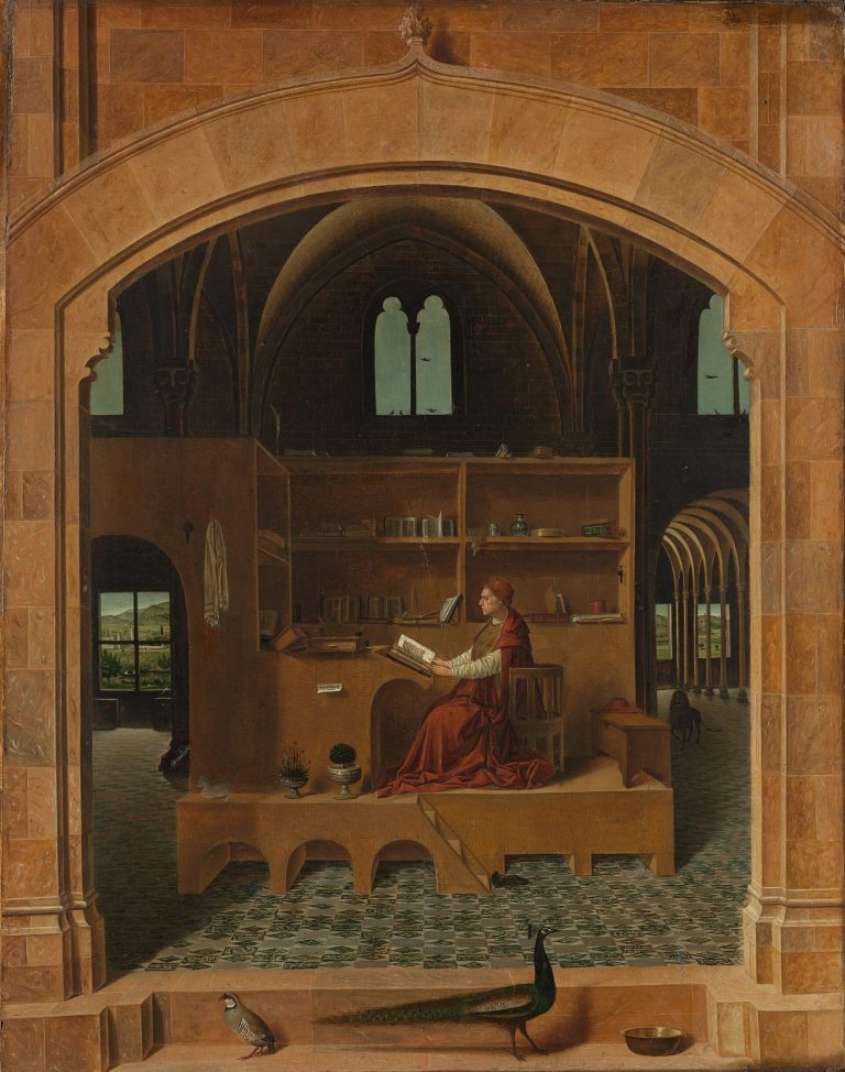 Students studying together with books and notes in a library